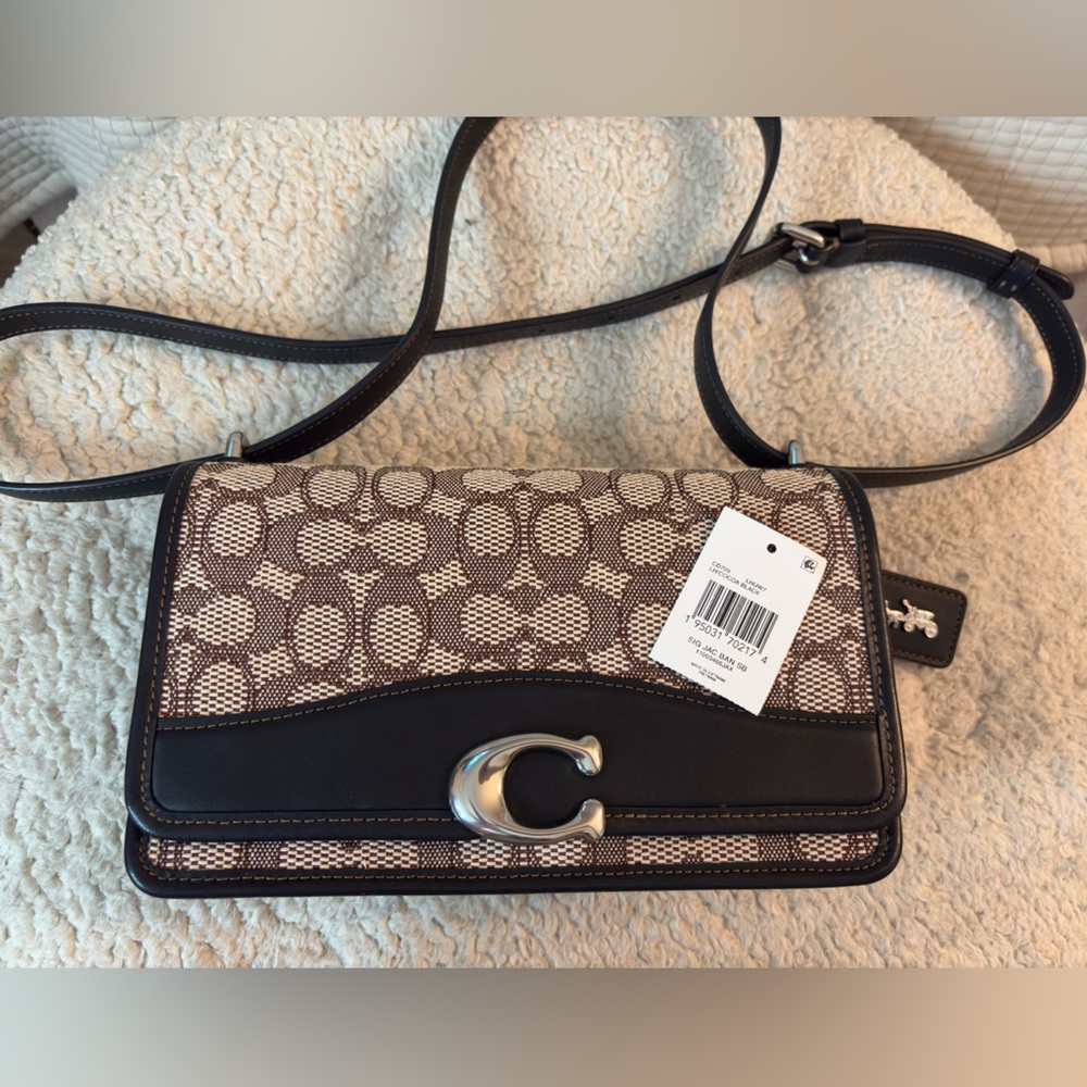 Coach Bandit Shoulder Bag
In Signature Textile Jacquard Silver/Cocoa Black